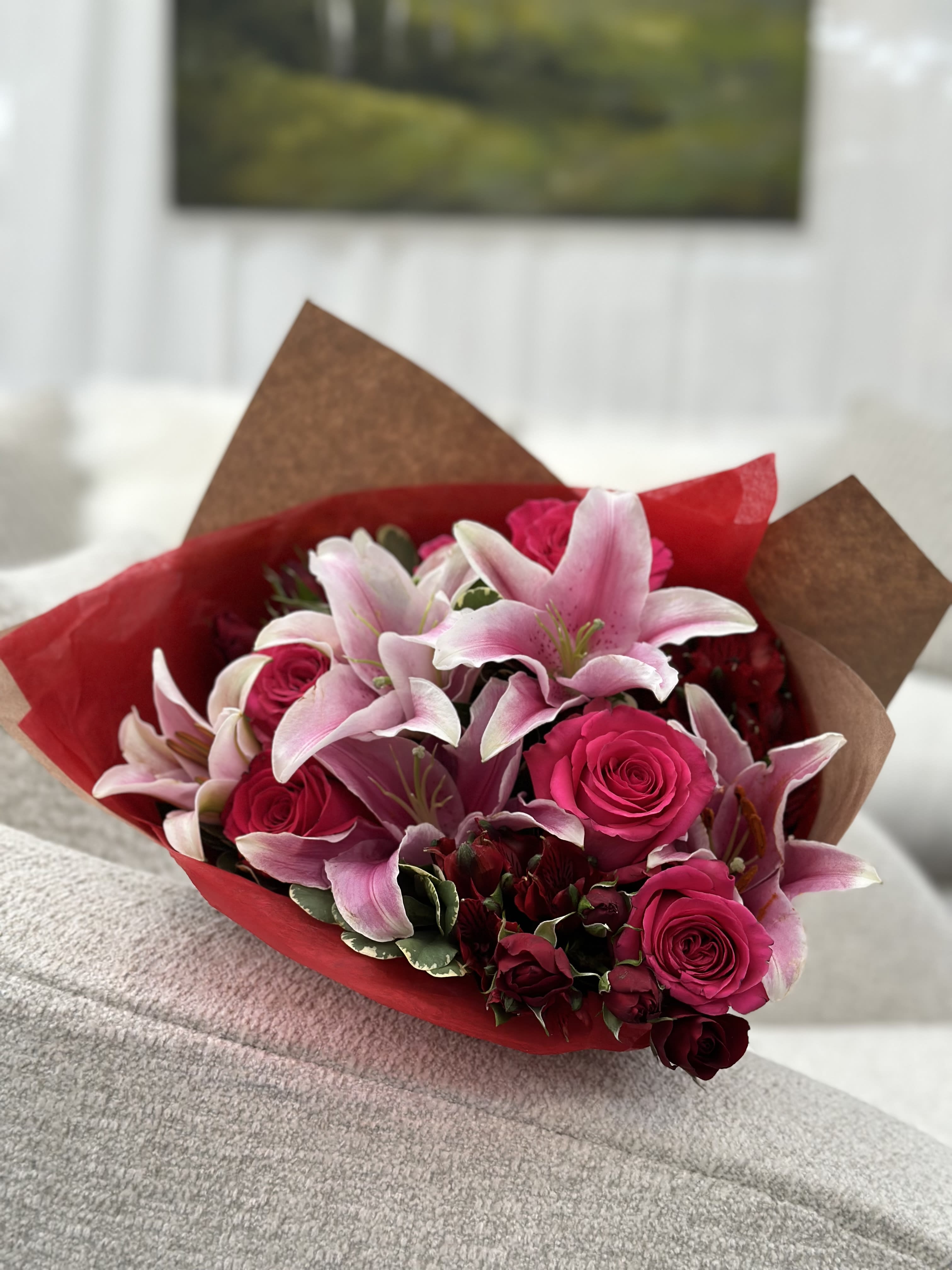 Forever Mine Signature Wrapped Bouquet  - Red and shades of pink signature wrapped bouquet  (image subject to substitutions depending on availability; color scheme and over all feel of arrangement is similar as possible)
