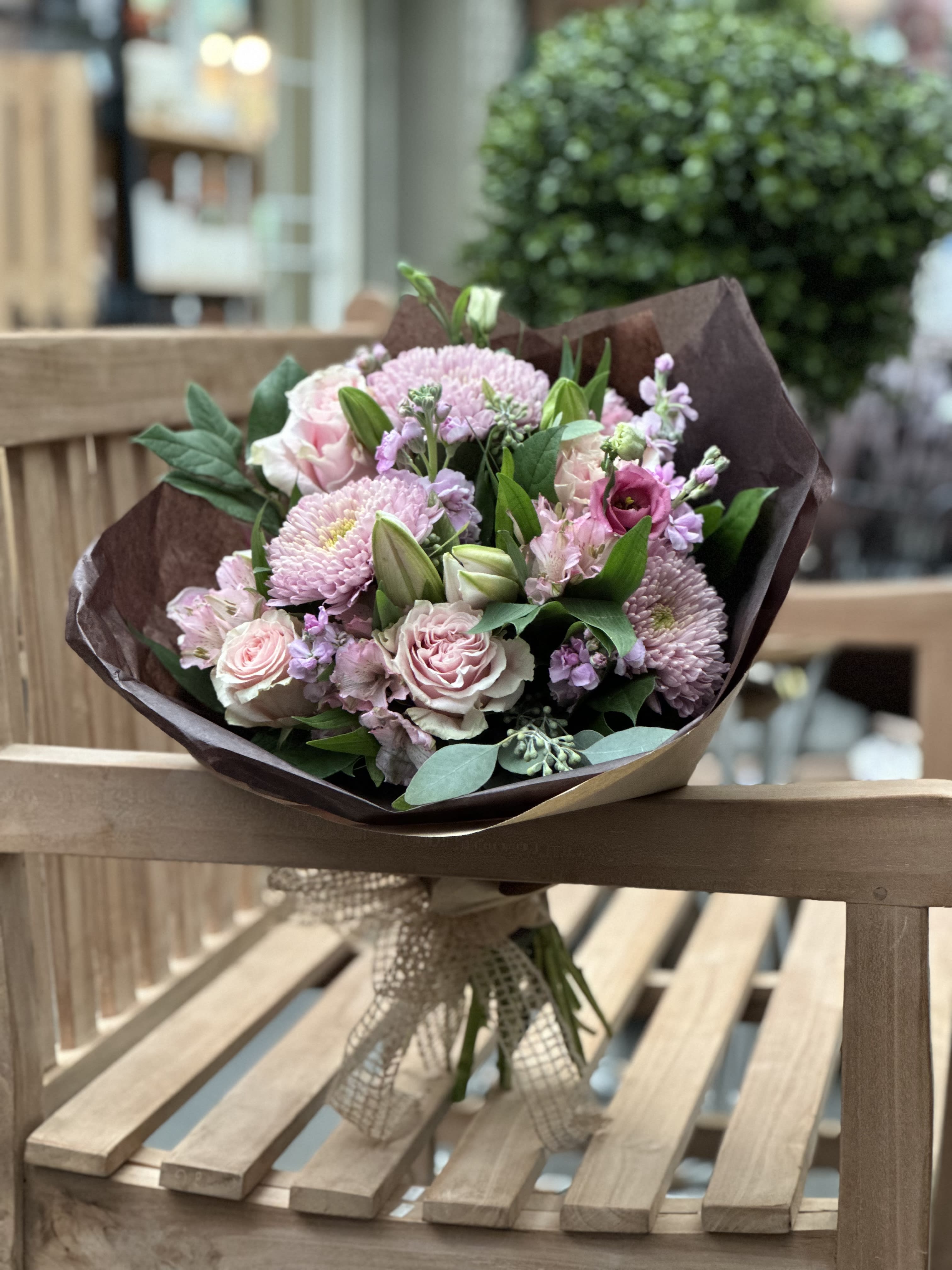 Pink Diamond Signature Wrapped Bouquet - Mixed pink bouquet with assorted greenery (flower substitutions may occur based on availability)