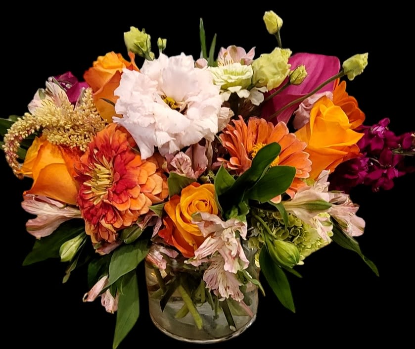 House Special Floral Design - When you aren't sure what to send, THIS is the perfect choice!!! A large 6x6 cylinder vase, full of seasonal blooms, mixed colors, add in some height and volume, and you have an amazing arrangement perfect for literally any occasion. All blooms will be what are in season!!