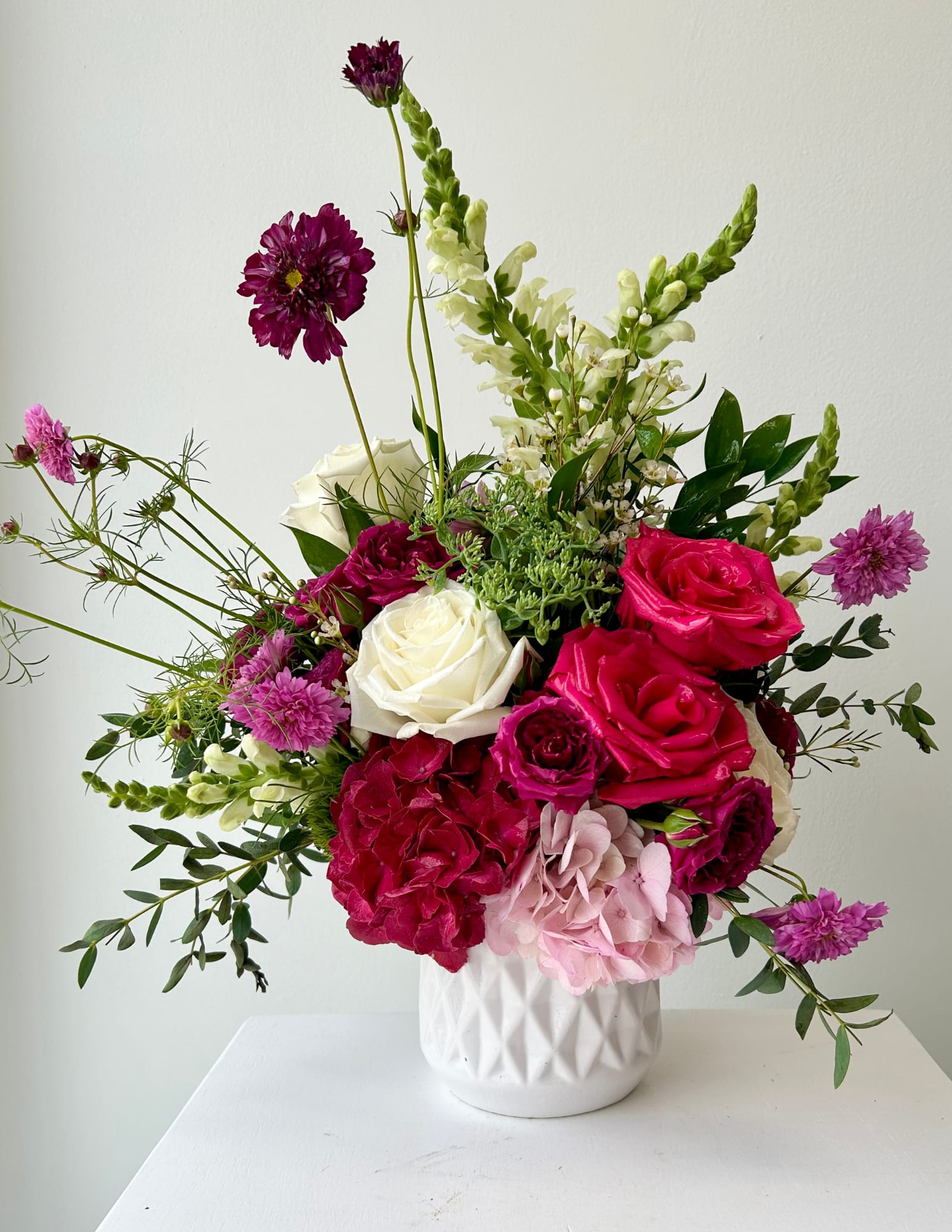 LOVE IN PETALS  - A lovely and bright flower arrangement, the ideal way to show someone you care and make their day extra special!