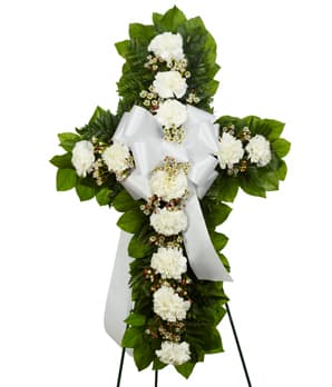 White Cross Spray - White carnations and wax flower with a white bow