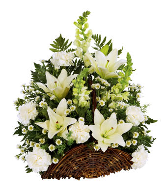 Fireside Remembrance  - As we reminisce by the fireside let our beautiful arrangement fill the air with the fresh scents of White lilies, Snapdragons and Carnations arranged in a wicker basket.