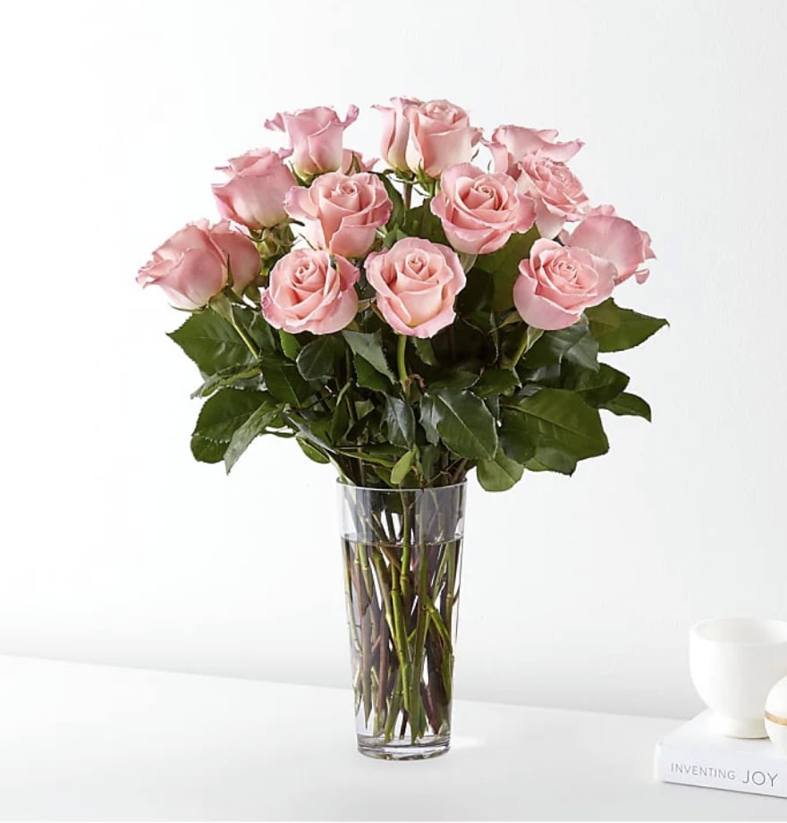 Pink Rose Bouquet - Enjoy the classic beauty of the rose with a playful twist in our Long Stem Pink Rose Bouquet. This arrangement features all pink roses that will look especially pretty in the hands of those you cherish most.