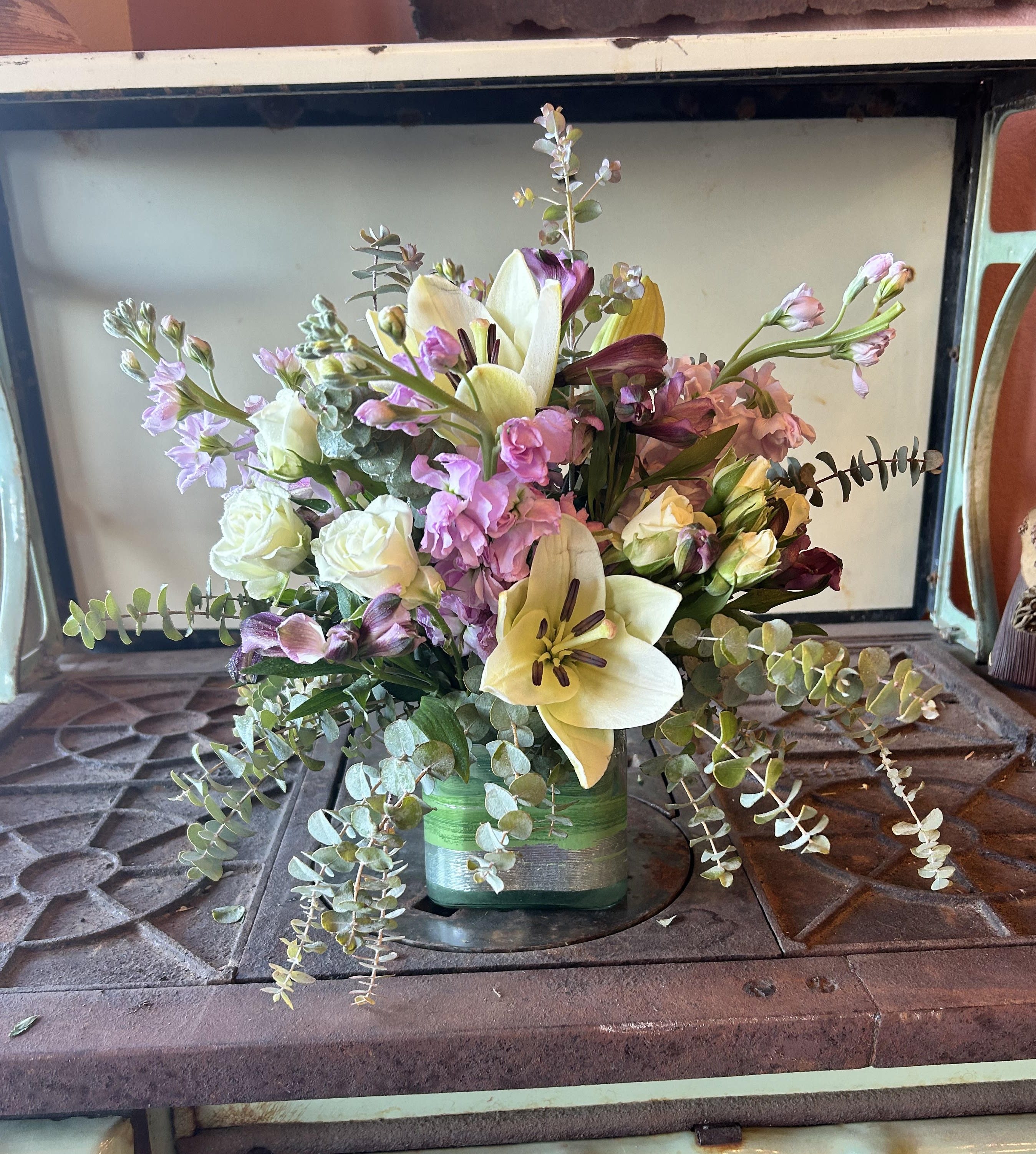 Gentle Breeze - Soothing scents of eucalyptus and stock flowers will make anyone's day. Together with spray roses and alstroemeria is perfect for the new baby, girlfriend, or mom.