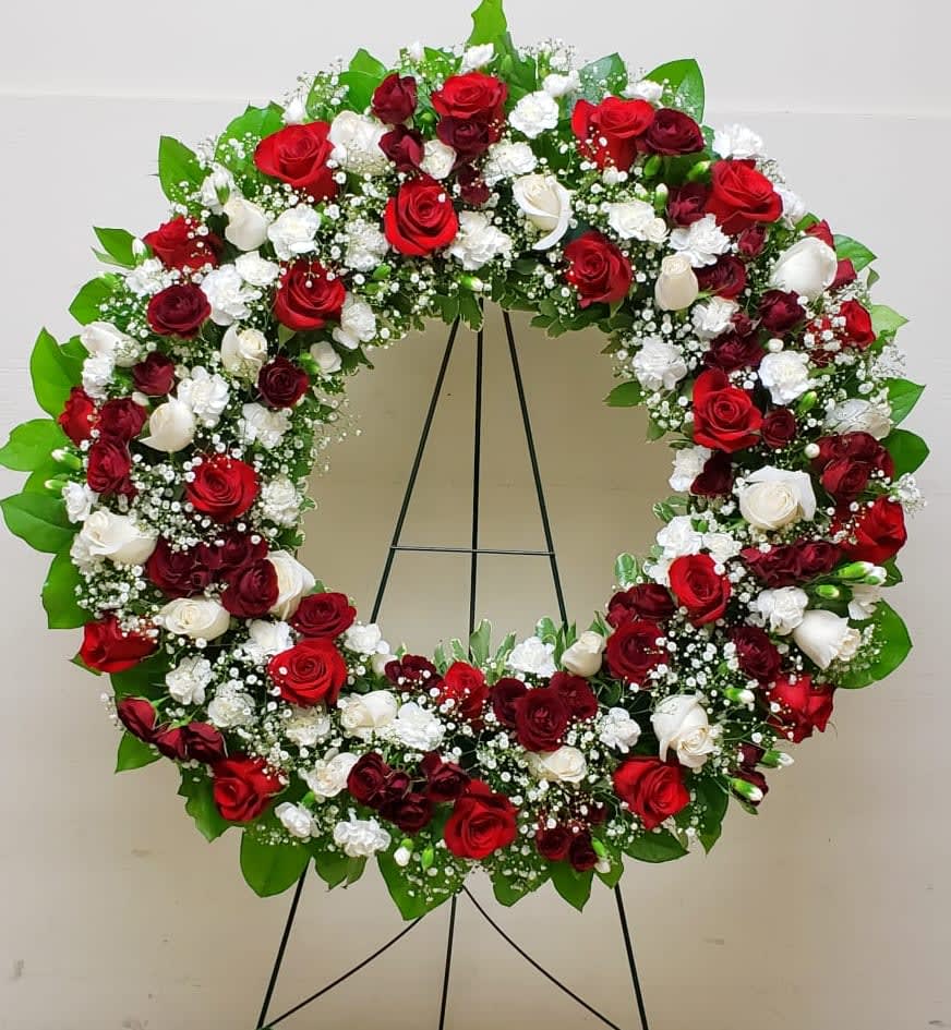[TT-ANC125P]:  36 INCH HOPE AND HONOR WREATH WITH ROSES - 36" HOPE AND HONOR WREATH WITH RED ROSES ON EASEL BY TWIN TOWERS FLORIST 