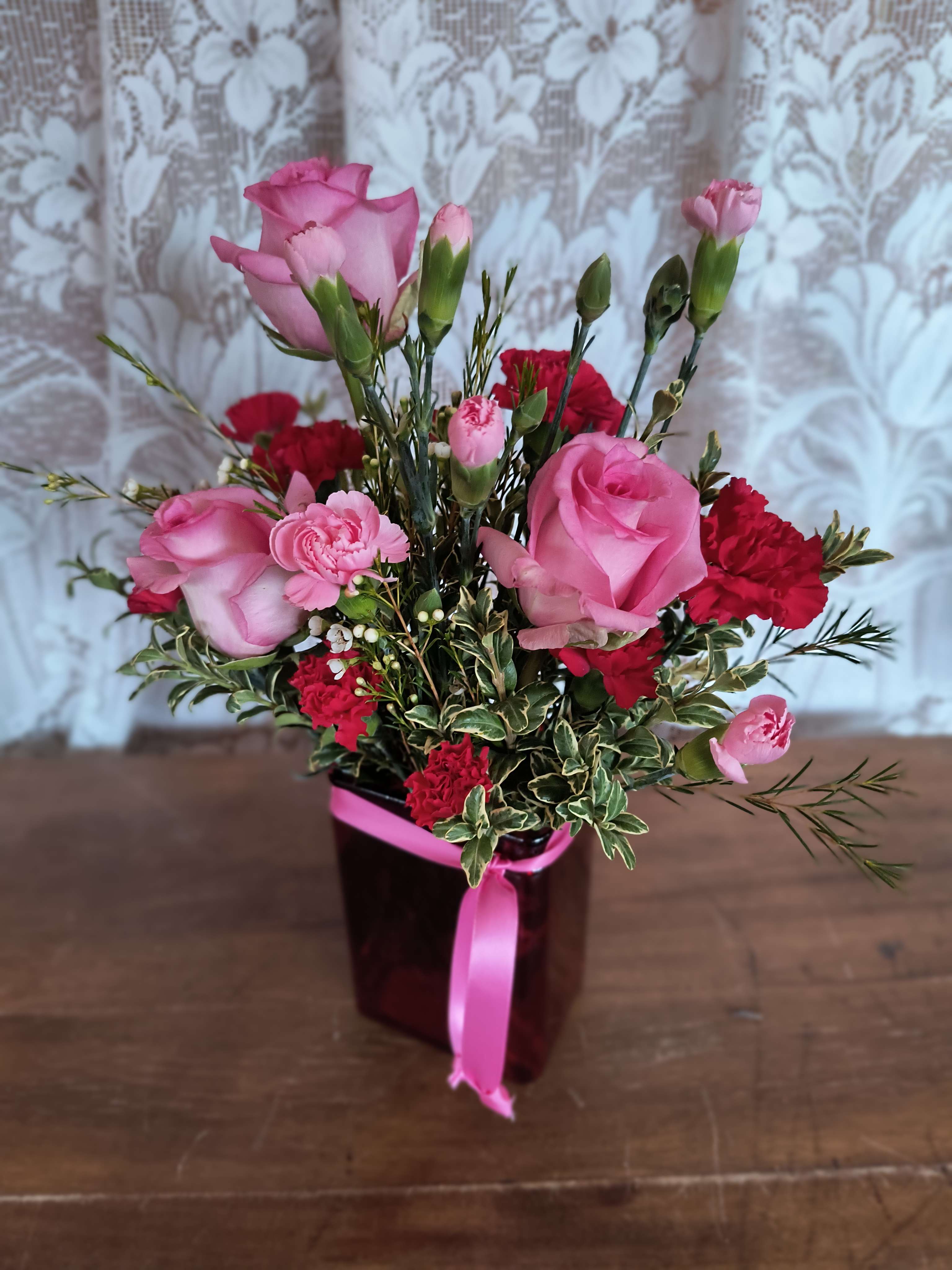 Girlfriend - Perfectly pink roses and carnations make this a sweet bouquet. If you're not sure about that 4 letter word or red roses this is the answer!