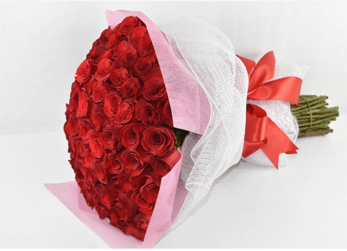 Bouquet of Love - 100 Rose Wrapped Bouquet - Show a special someone that you love and appreciate her with this beautiful bouquet of 100 Roses. Available in other colors upon request while supplies last.