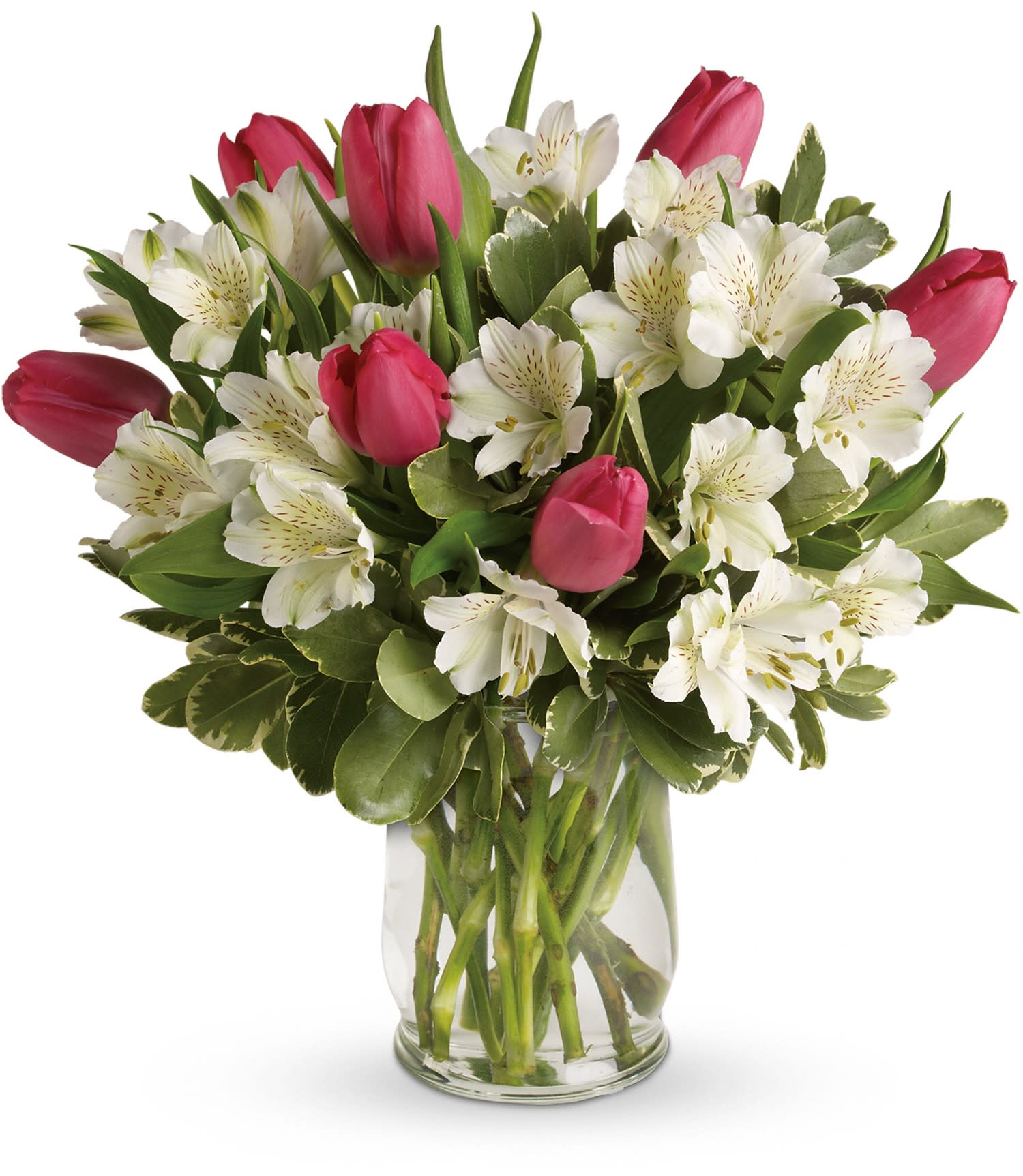 Spring Romance Bouquet - Romance buds in the spring - and it blooms beautifully in this charming bouquet of tulips and alstroemeria. Presented in an elegant hurricane vase, it's a heartfelt gesture she'll remember through all seasons. 