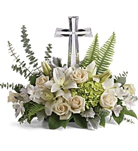 Life's Glory Bouquet - This peaceful bouquet of soft white flowers and green accents is a beautiful message of sympathy, adorned with a large crystal cross keepsake. Green hydrangea, crème roses, white asiatic lilies, and white alstroemeria are accented with dusty miller, sword fern, spiral eucalyptus, and lemon leaf. Delivered with a Large Crystal Cross Keepsake. Approximately 22 1/2" W x 18" H