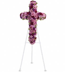 Deepest Faith Standing Cross - Pride, dignity, admiration and faith are on beautiful display in this moving sympathy arrangement. It's a meaningful way to deliver your heartfelt message. Beautiful flowers such as lavender roses, carnations and cushion spray chrysanthemums along with fuchsia and purple carnations and button spray chrysanthemums create a dazzling cross that is full of hope and devotion. Approximately 23" W x 38" H