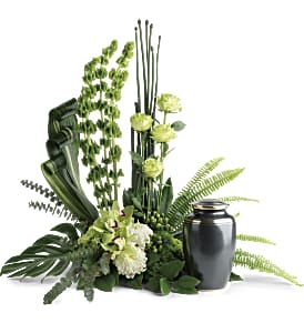 Tranquil Peace Cremation Tribute - This elegant, Eastern-inspired arrangement of hydrangea and orchids surrounds the cremation urn with a natural peace and tranquility. This unique arrangement features miniature green hydrangea, green cymbidium orchids, green orchids, green carnations, green trick dianthus, bells of Ireland, white disbud chrysanthemums, green button spray chrysanthemums, green hypericum, equisetum, sword fern, aspidistra leaves, spiral eucalyptus, monstera leaf, and lemon leaf. Arrangement does not include urn. Approximately 34" W x 30" H
