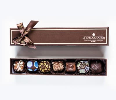 7 Pc Assorted Chocolate Truffles (DL) - Le Chocolatier’s Selection of exquisite, melt in your mouth flavors of superb ganache centers enrobed in the ultimate highest quality chocolate couverture. Choose from either fruity flavors, our liquor selection, more classic array or a combination of all three! Select from original dairy (widest variety of milk, dark and white couverture using authentic creams), Parve /Lactose Free (dark chocolate utilizing vegan friendly recipes) or CY/Special Kosher. Truffle Flavors: Guinness &amp; Pretzels, Blue Moon Citrus, Cappuccino, Champagne, Kahlua, Passion Fruit, Salted Caramel. Handmade locally in small batches.   