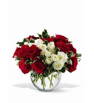 Sparkling Celebration - For a sparkling celebration, choose this impressive bouquet of a dozen red roses, accented with white spray roses and variegated holly and arranged in a clear glass bubble bowl. It's an elegant treat of a bouquet, to brighten up any holiday occasion! Tfweb102