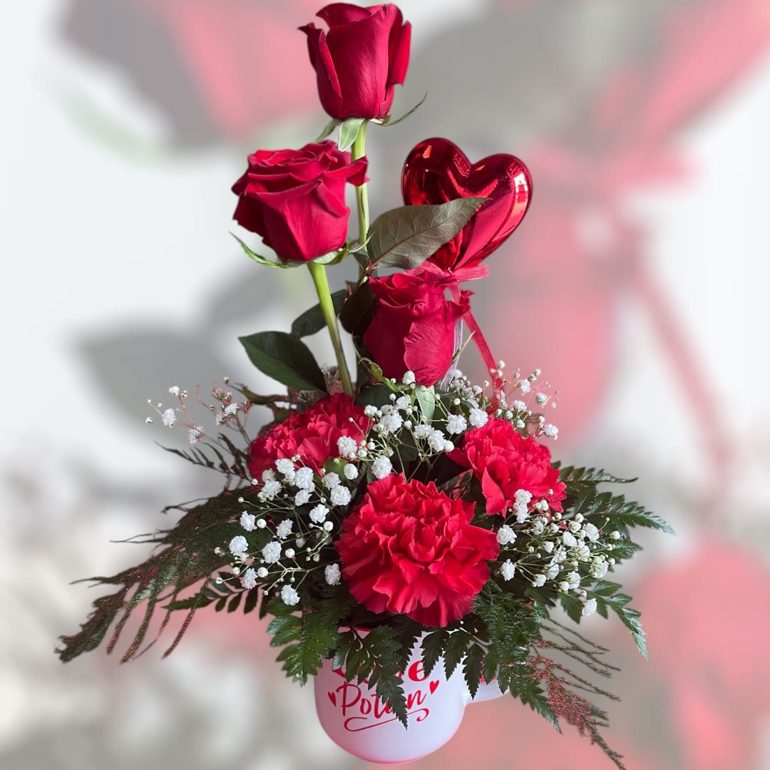 Love Potion - Contents: A magical mixture of fresh blooms in a keepsake ceramic mug. Uses: Sight, Smell, Taste. Flowers smell amazing and look beautiful, Mug can be used for future potions! Caution: Will make recipient feel special and loved.  (All designs are arranged as similar as possible. We promise to keep the same color, style, and overall theme with what Mother Nature generously blesses us with