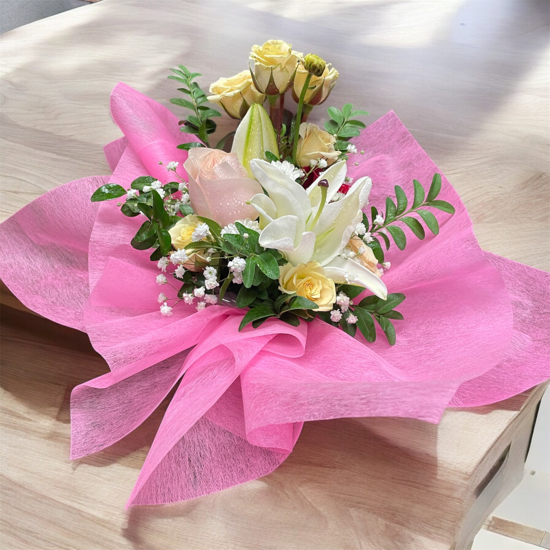 A beautiful day 15  - Substitution Policy  Photos show the overall style and theme of each arrangement. Some flowers or vases may vary due to seasonality, weather, or availability. If substitutions are necessary, we will maintain the design’s style, color palette, and value.  Please note any important design preferences in the florist instructions at checkout or contact us to confirm availability.  Flower Care &amp; Guarantee  We guarantee flower freshness for 24 hours after leaving our shop.  Care Tips:  Cut flowers: Trim stems and change water every 2–3 days.  Foam arrangements: Add about 1 cup of water every couple of days.  After 24 hours, proper care is the customer’s responsibility.