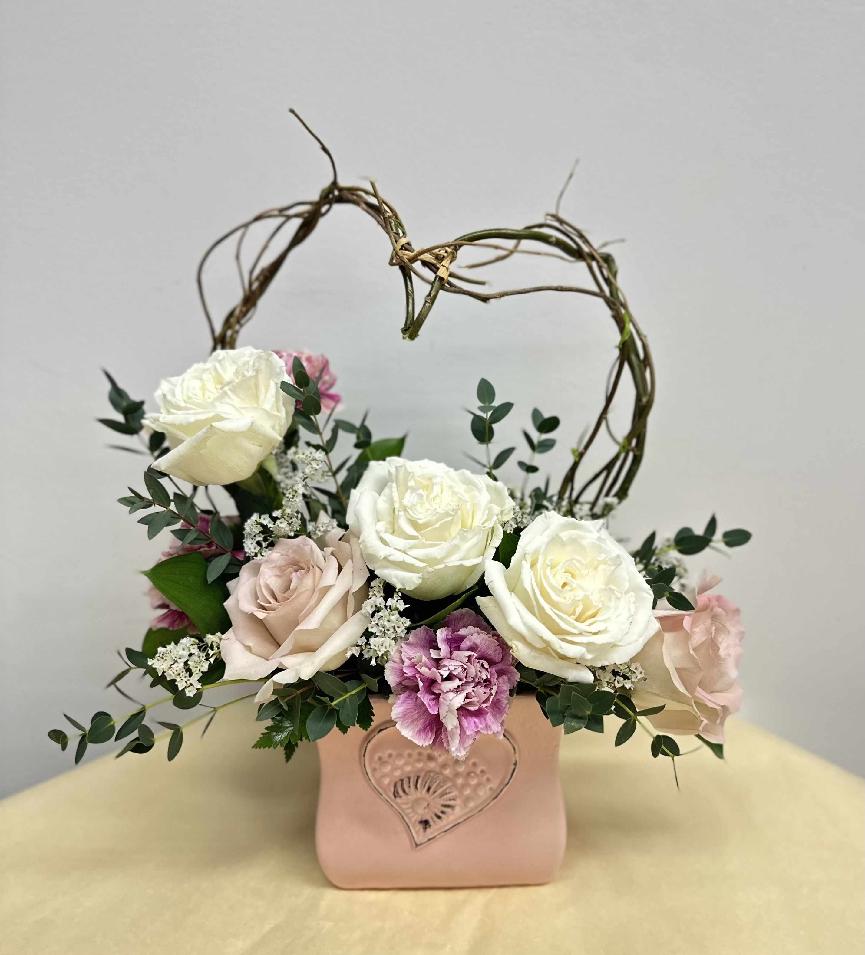 Cupid's Garden - Evoking the playful spirit of Cupid, this enchanting arrangement captures the essence of love, perfect for a special someone or a heartfelt celebration.
