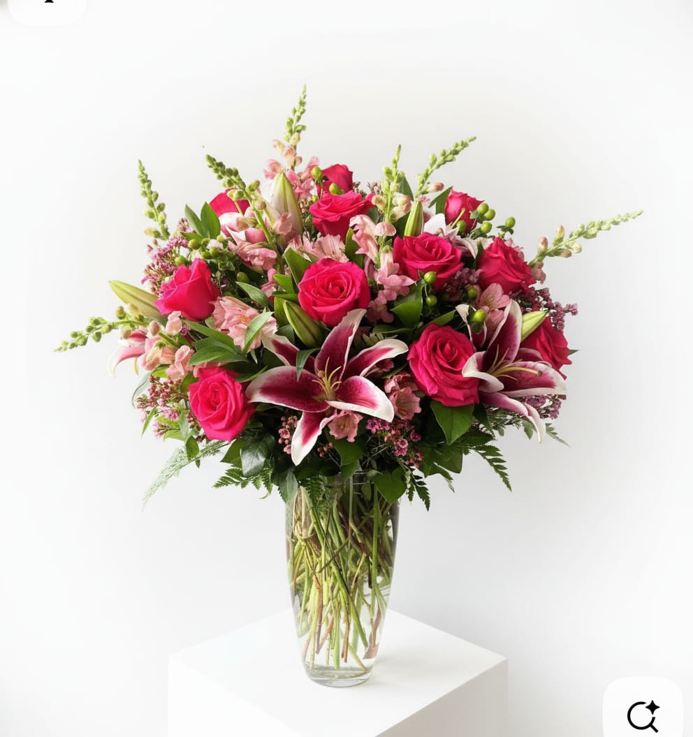 Pink Lily &amp; Rose Vase arrangment - A fresh arrangement of vibrant pink roses and lilies with lush greenery, styled in a clear glass vase. Bright, elegant, and perfect for any occasion.