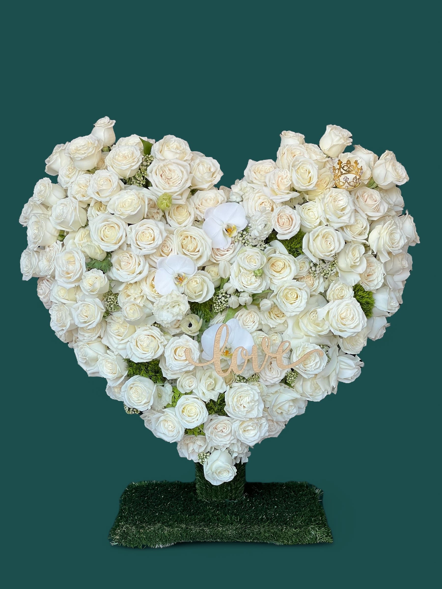 My Heart  - A heart-shaped standing arrangement, filled with white Roses, finished with white Phalaenopsis Orchids and gold accents