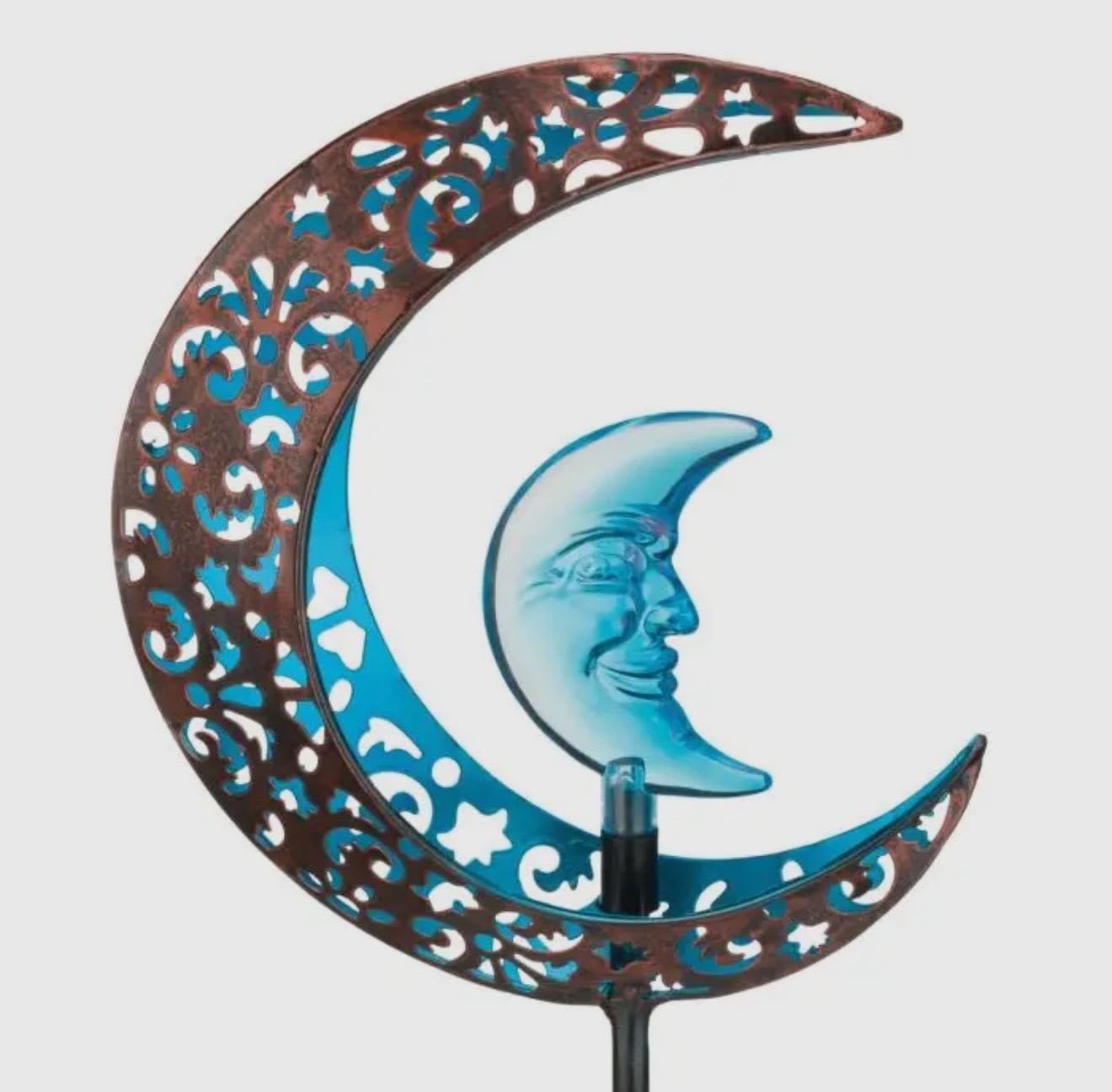Moon solar stake  - A center acrylic Blue Moon is ensconced by a filigree metal moon illuminated with flashing LED lights.  Available in 2 styles - Sun or Moon center lights.