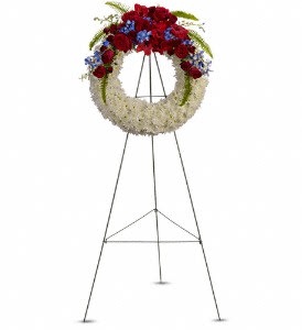 Reflections of Glory - A stunning display of patriotism, strength and sympathy. This red, white and blue wreath delivers a lovely message about the dignity of the deceased.