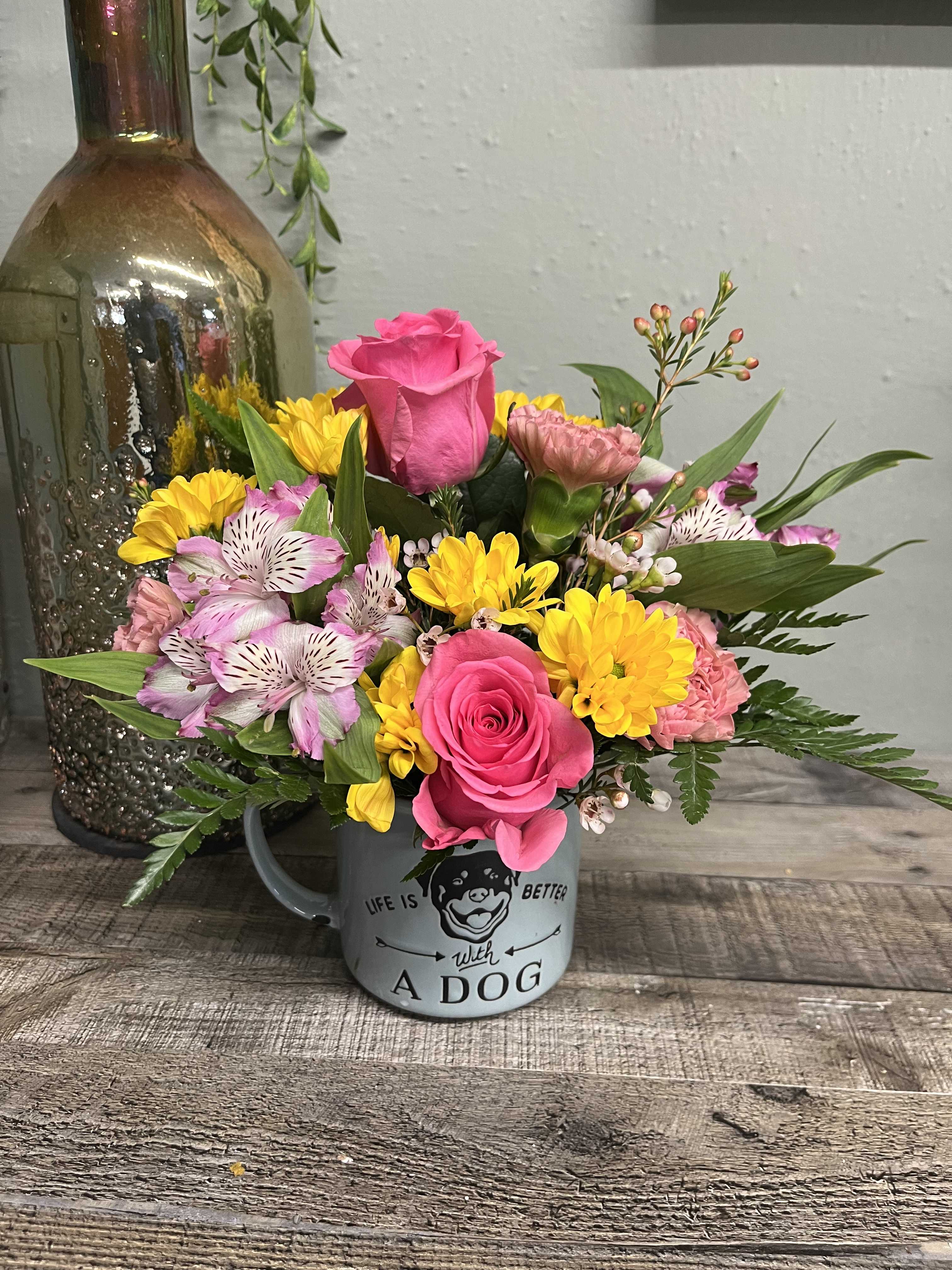 Dogs Rule!  - Blue Sky Clayworks Dog Mug with an assortment of fresh blooms. We will fill this ceramic mug with seasonal flowers in different hues and kinds. You can’t buy love, but you can rescue it. 