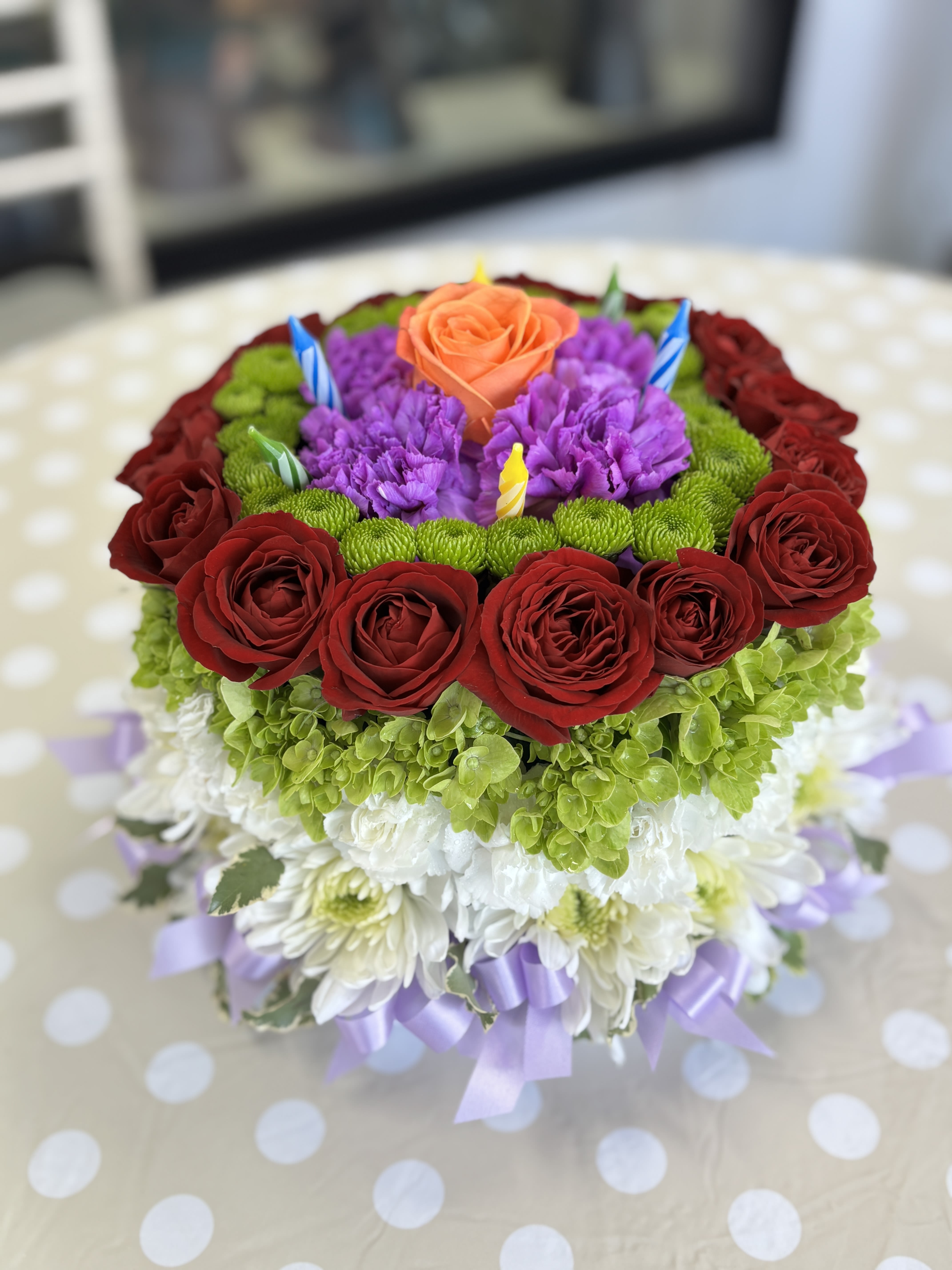 A Very Happy Birthday Cake   - one way to celebrate a birthday by giving them a beautiful birthday cake of fresh flowers! including roses, mums, hydrangea  &amp;  candles ( flower cake design and colors will vary based on availability) 