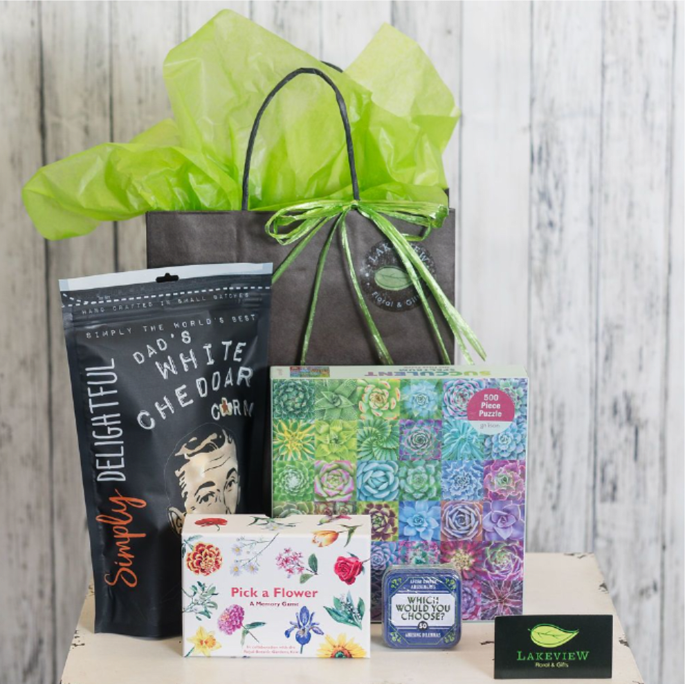 Adventure - Fun brain games for a night in, accompanied by gourmet popcorn. Includes a 500 piece puzzle, memory game, trivia game and a savory or sweet popcorn!