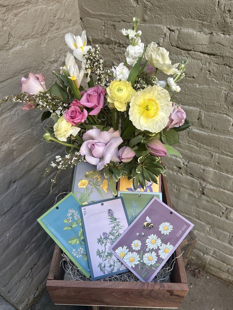 Gardener's Delight - A beautiful bounty of flowers for now... and later!  A handmade wooden box features a gorgeous flower arrangement of local poppies, tulips and other garden pretties, PLUS 6 Shido designer seed packets for planting in your own garden!  Arrangement measures approximately 16" tall x 13" wide.  