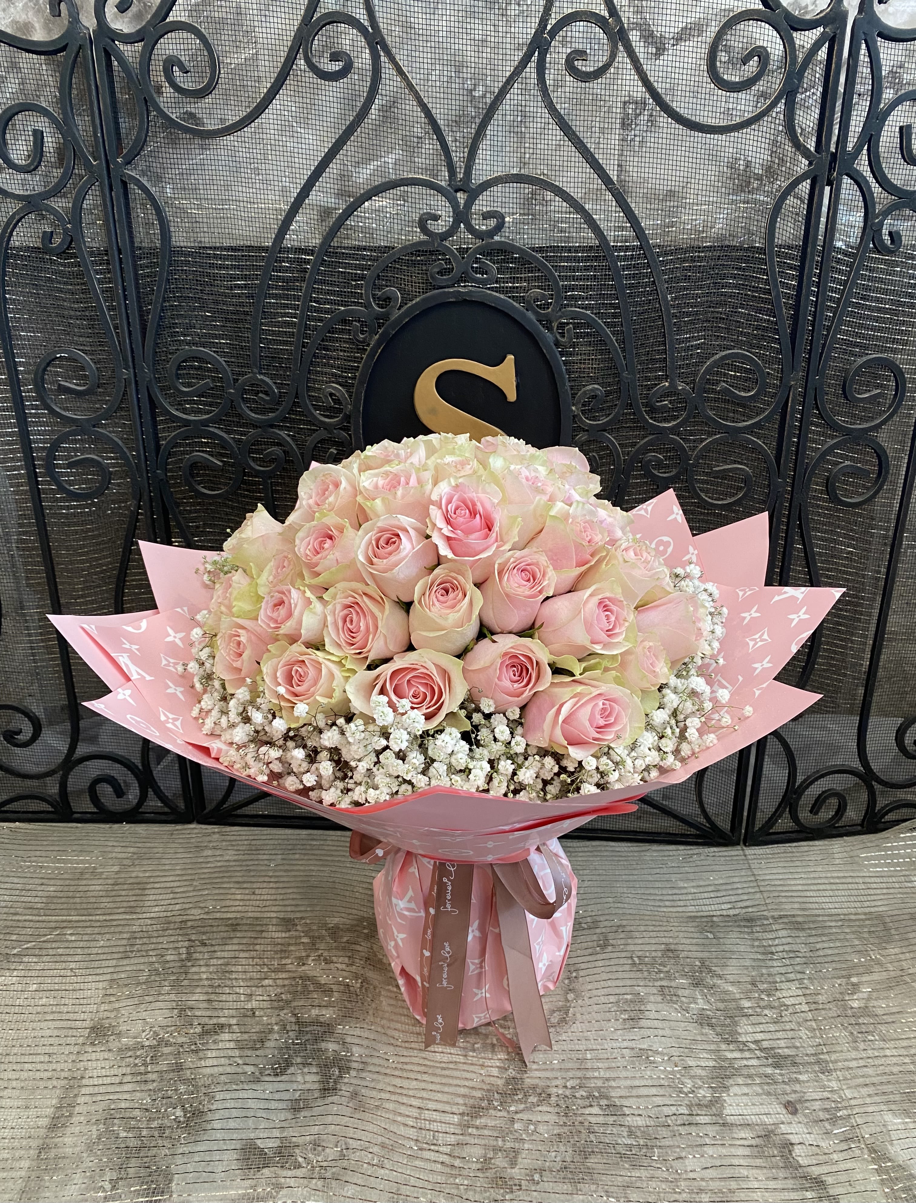 50 Baby pink Roses On Promotion - Approximate 18'' H x 23'' W With Special Design Paper. The Design Paper's Pattern May Be Different Depends on Available.