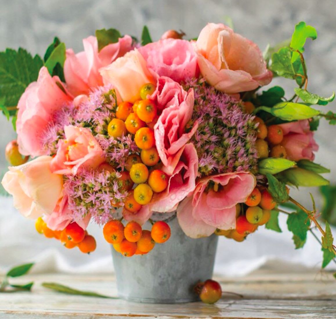 Welcome Spring - Anemones, berries, seedum and lisianthus in shades of pink and peach