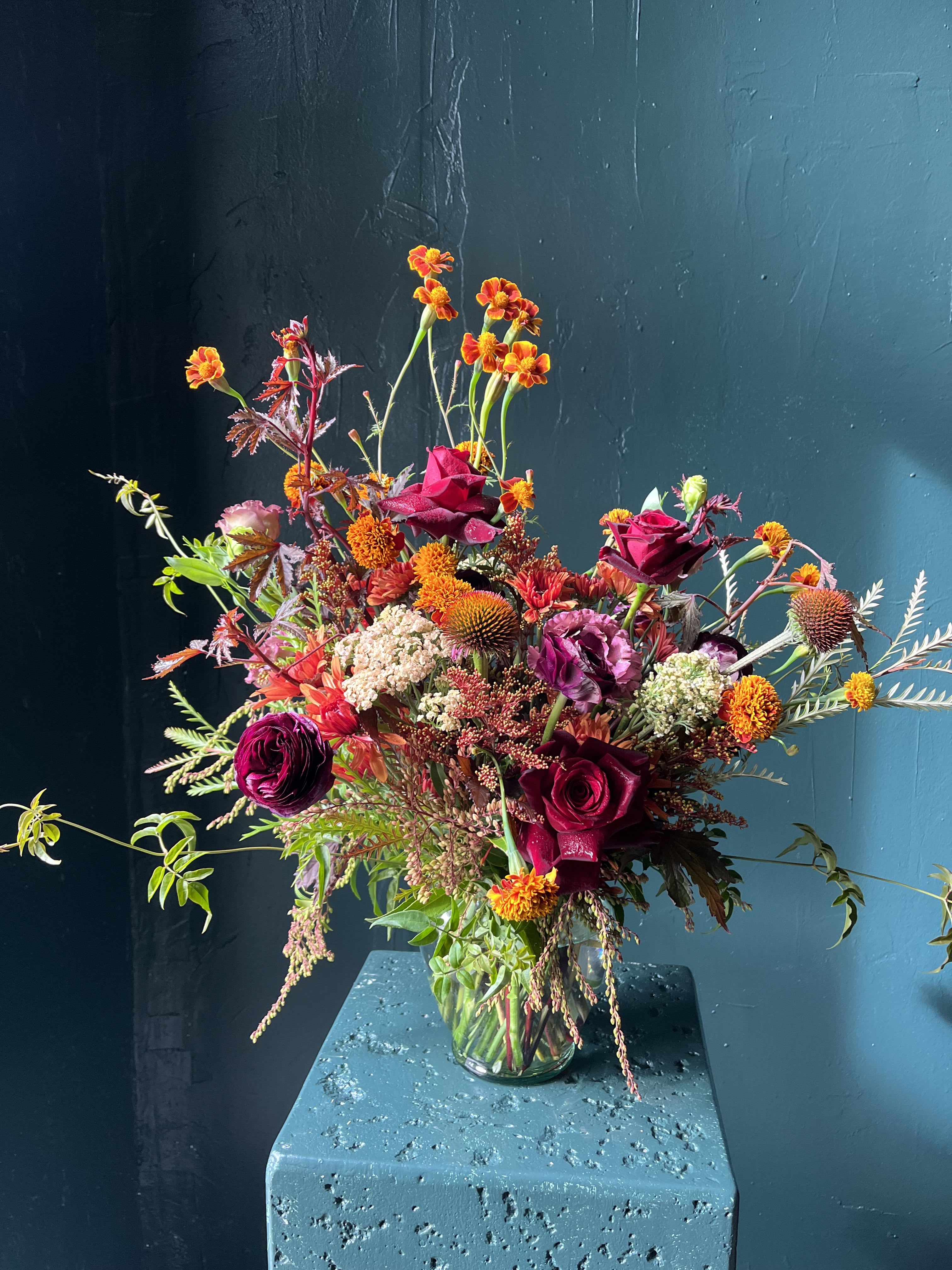 Seasonal Vased Arrangement  - Each of our arrangements is a one-of-a-kind creation, thoughtfully designed using the freshest flowers sourced directly from the flower market each morning. Because our designs are always inspired by what’s in season, every arangement is unique and beautifully reflects the changing seasons, offering something fresh and special every time. If you have any specific flowers in mind or inspiration please let us know! We’re happy to tailor each arrangement to your preferences for a truly personalized touch.  