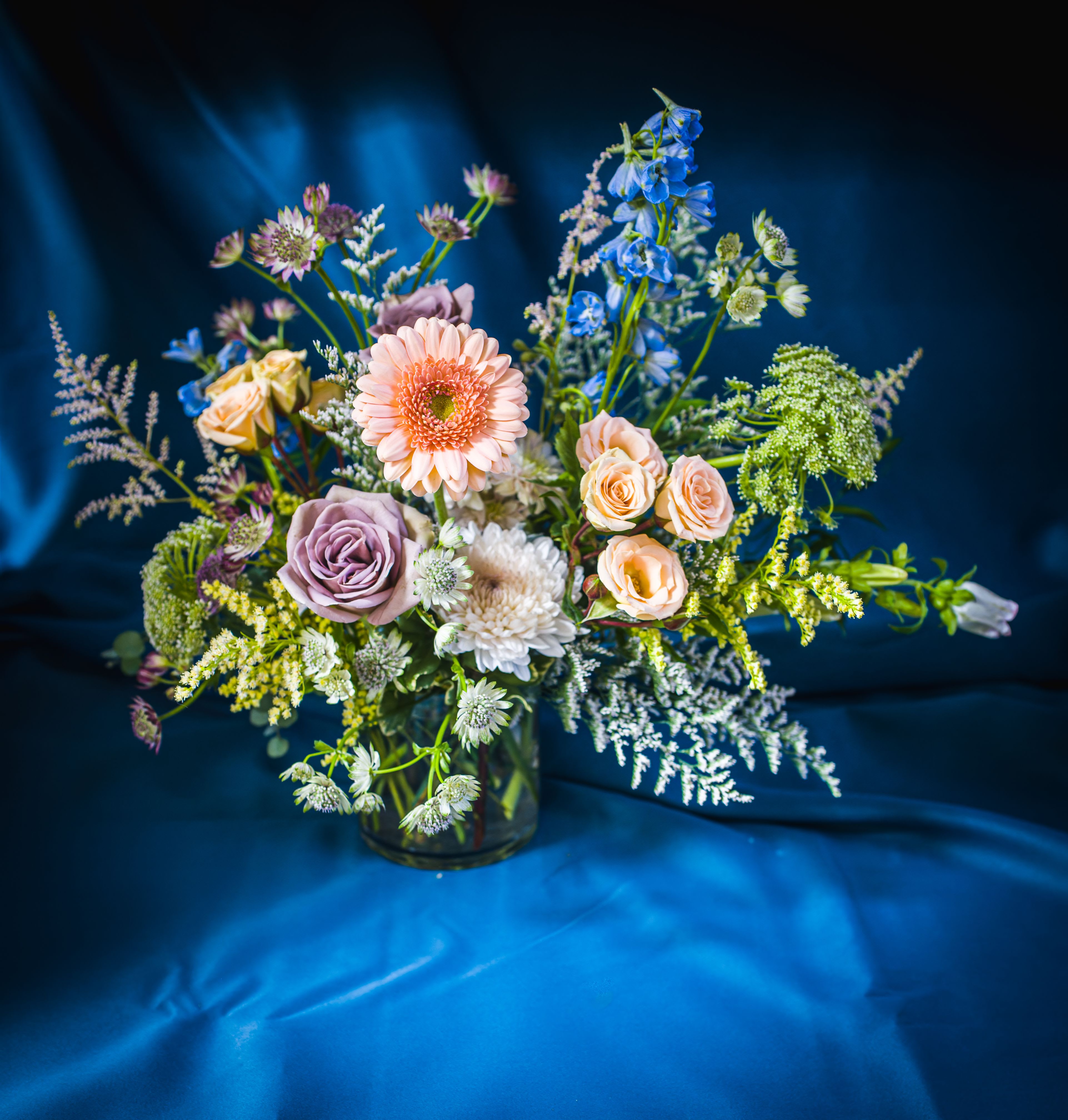 Designer's Choice "SEPIA PASTELS" Vased Arrangement  (Pastels, light &amp; airy) - Soft hues of peachy pink, buttery yellow and lavender are the stars of this pastel arrangement. 