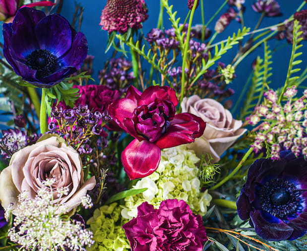  Designer’s Choice, "VELVET AMETHYST" Wrapped Bouquet   - A delectable collection of rich plums, deep burgundies, textural greens and tinted creams is sure to please the most sophisticated flower aficionado. 