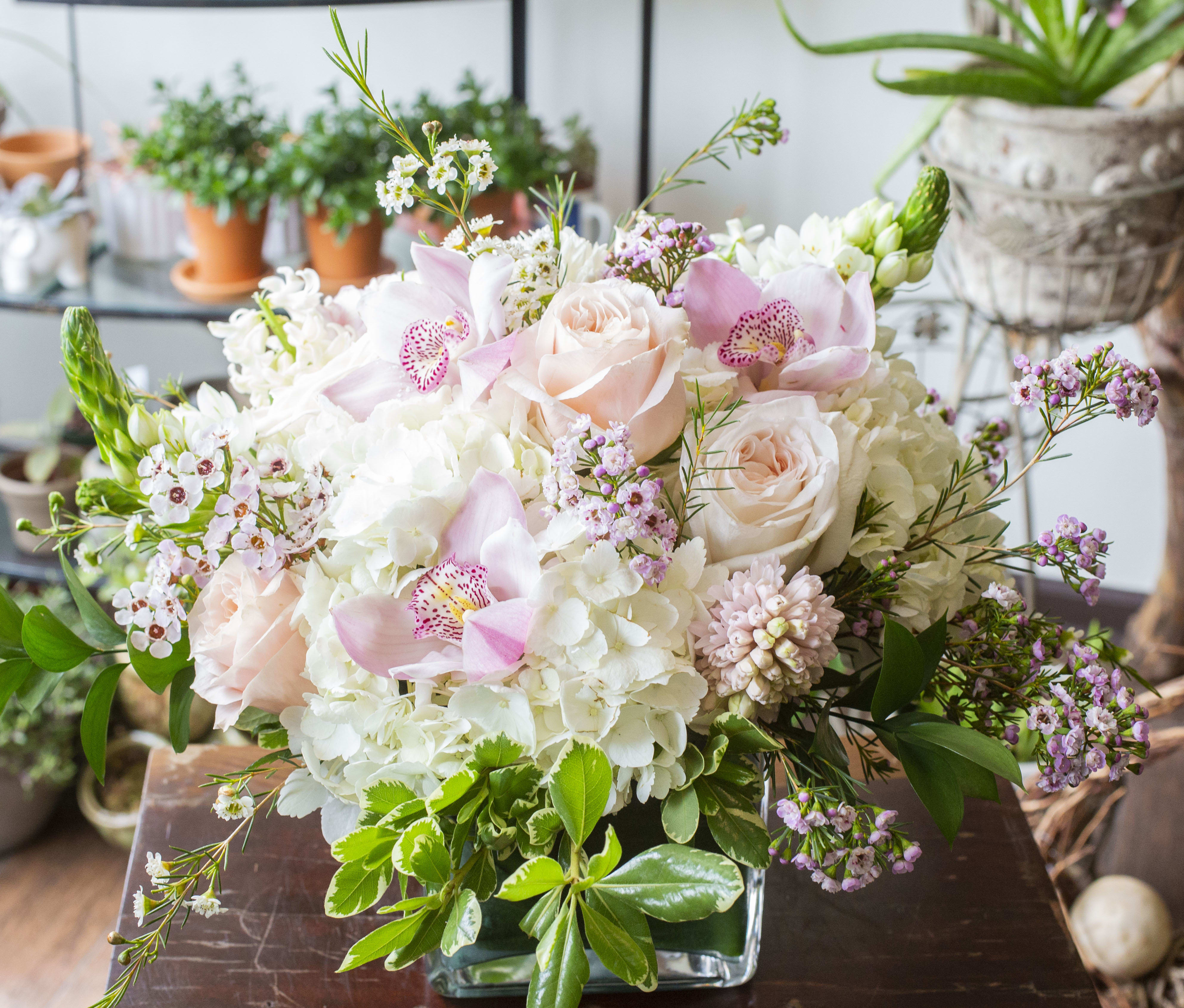 Julia - Luscious and gentle.. Cymbidium Orchids, Roses, Hydrangeas, Dubium, Wax Flowers with seasonal accents