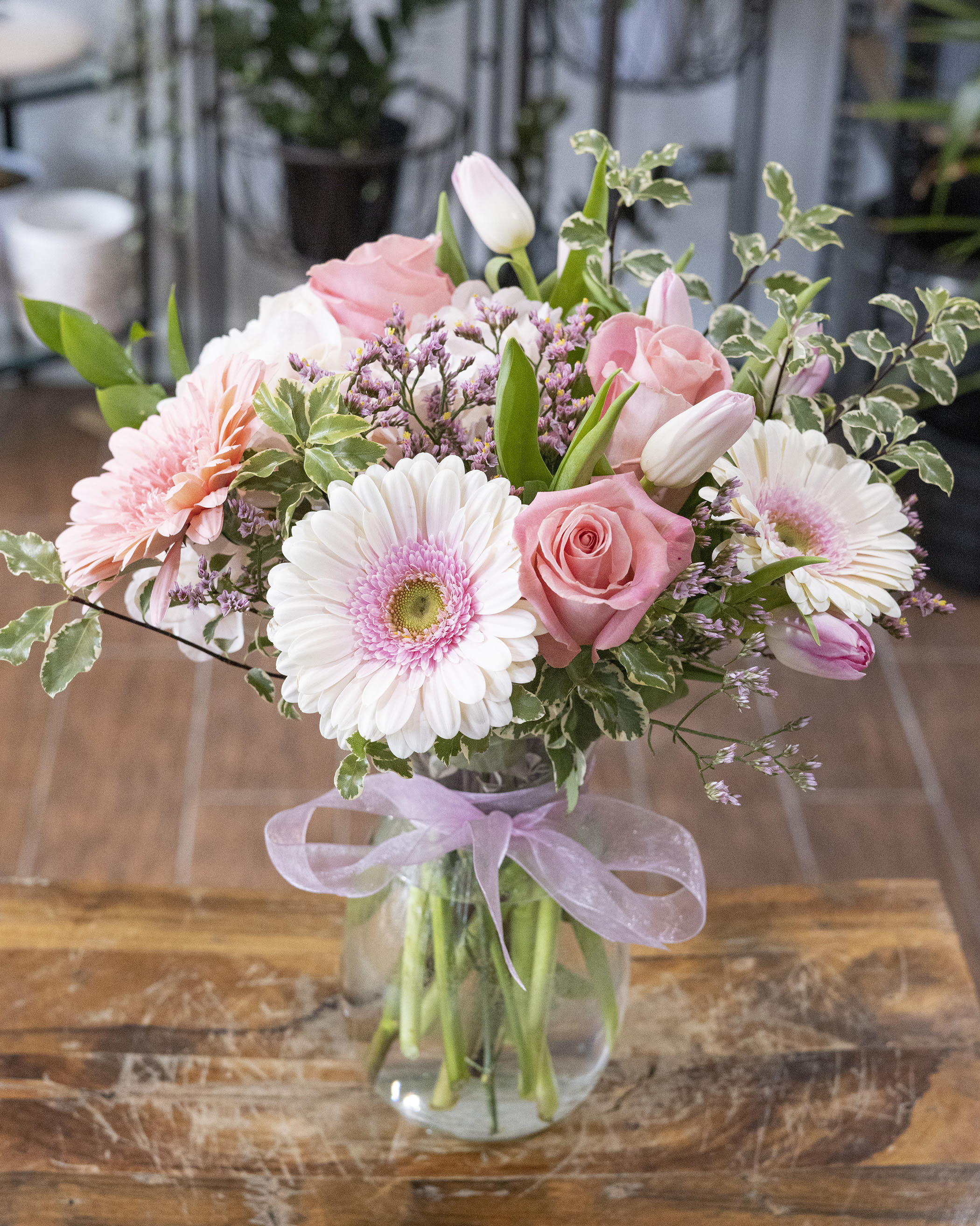 Melissa - Pink spring flowers in a glass vase