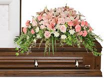 SOFTLY AT REST Casket Arrangement - Casket spray designed with soft pastel pink fresh flowers for your loved one