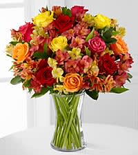 Special Sentiments - Vase arrangement of mixed colored roses, alstromeria lillies and pretty filler flowers arranged in a garden vase. This design would be good to send to a loved one's home or office 