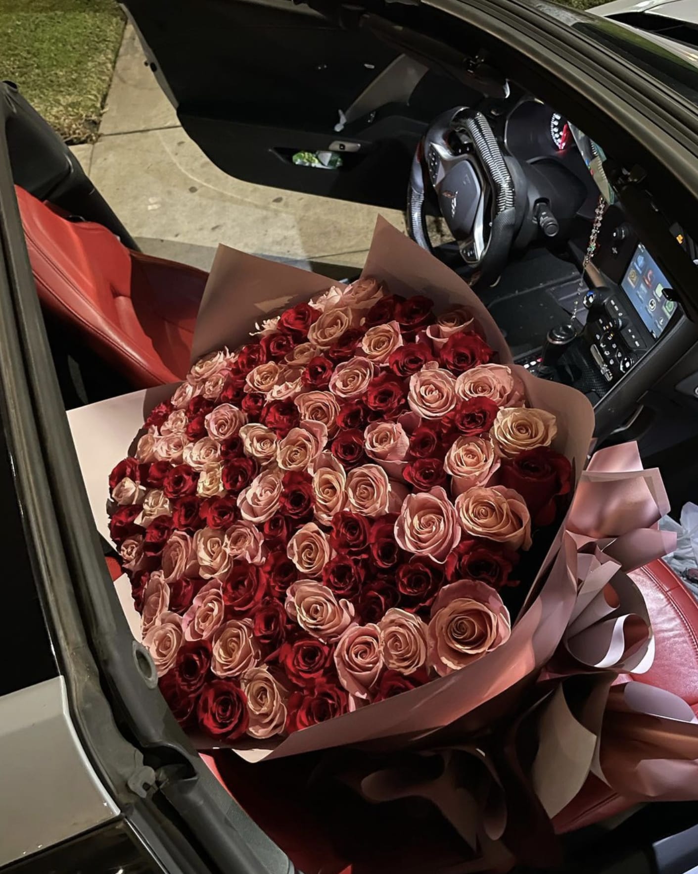 Blush Crush - Dazzle your special someone with a gorgeous 100 roses wrapped bouquet. 