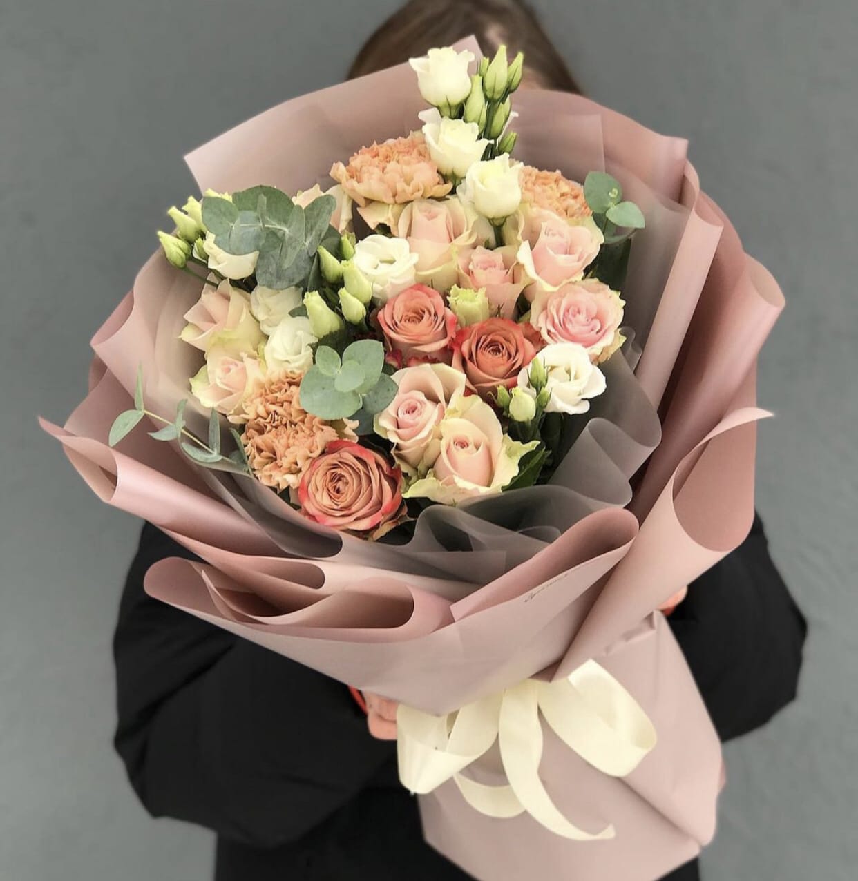 Pink and Peachy bouquet - Variety of flowers such as Roses, Carnations, and other blooms in beautiful wrapping is perfect for any occasion.