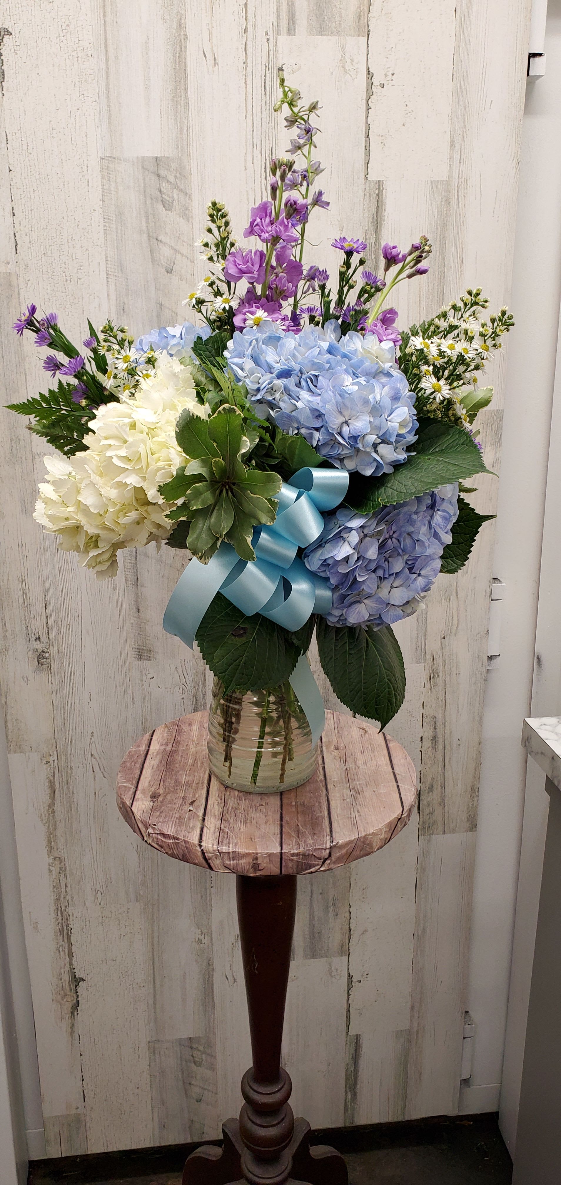 Heavenly  - Beautifully feminine. Serene but strong. This pretty vase of  flowers is a lovely way to show you care. 