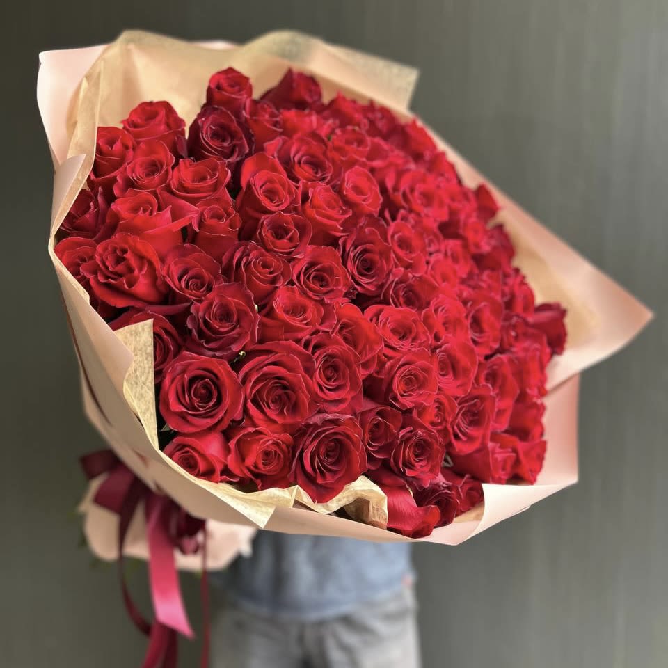 Passionate Embrace  - 80 delicious and vibrant red roses wrapped as a bouquet. 
