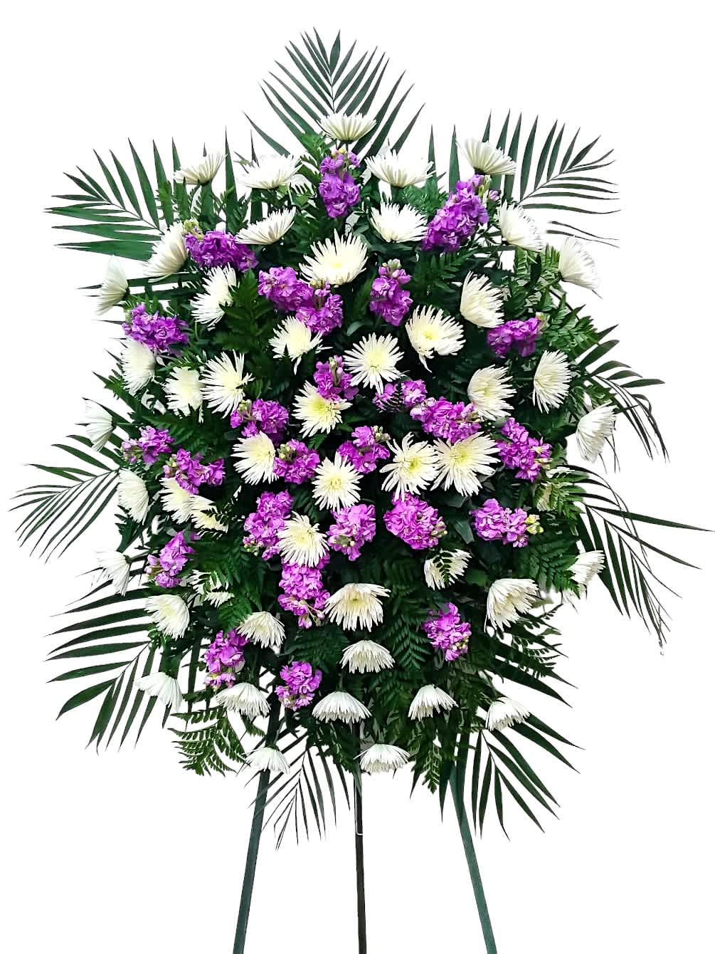Purple Blessings - Fragrant purple stock and white chrysanthemums alternate in a gorgeous standing spray arrangement. This type of design is usually approximately 5 - 6 ft tall and is meant for funeral services ONLY. This design includes a free banner (please include a banner sign in the Special Instruction Box or Message Box with the title “BANNER”).  In the event a banner space is left blank for any reason, ONLY a card message will be included. Banners are printed in a black 2.5-inch wide ribbon with silver ink. Currently, we don't offer any other colors. If the service is the same day as the order was placed we cannot guarantee delivery by a certain time. And flowers will be delivered during normal business hours.  To ensure the delivered flowers match the displayed photo as close as possible we recommend ordering 3-5 days in advance. For the same or next day deliveries, we reserve a right to substitute flowers with the same or greater value.