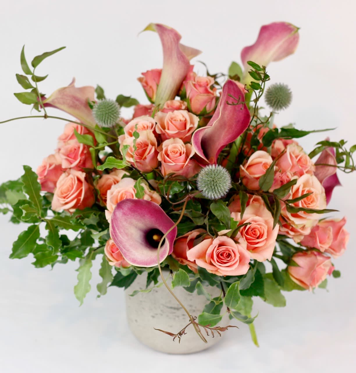 Versailles roses - Spray Rose and calla lilly are natural and luxurious. 