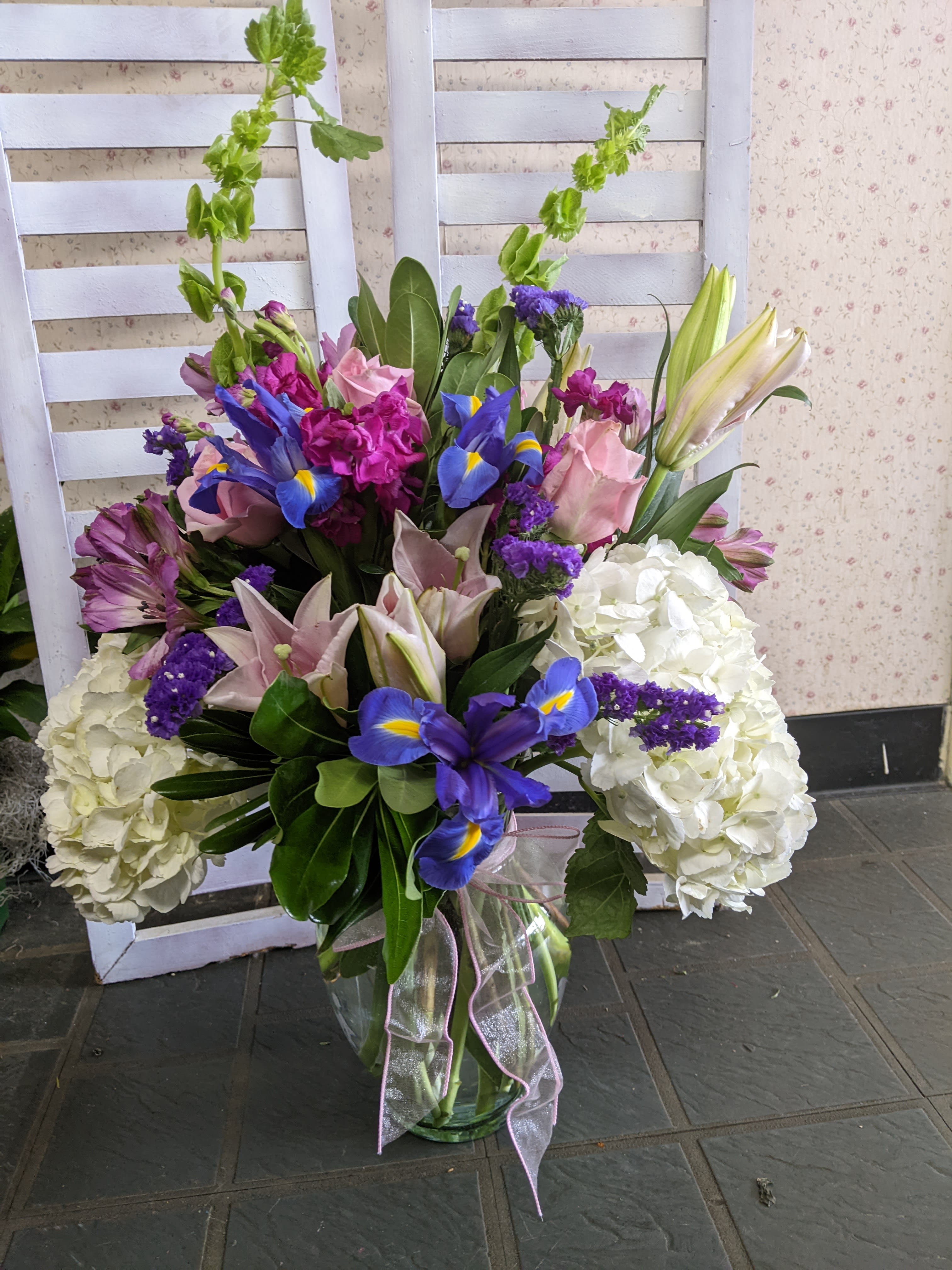A Spring Afternoon - Want the WOW factor? Bells of Ireland, hydrangeas, iris, lilies, stock, roses, and more! 