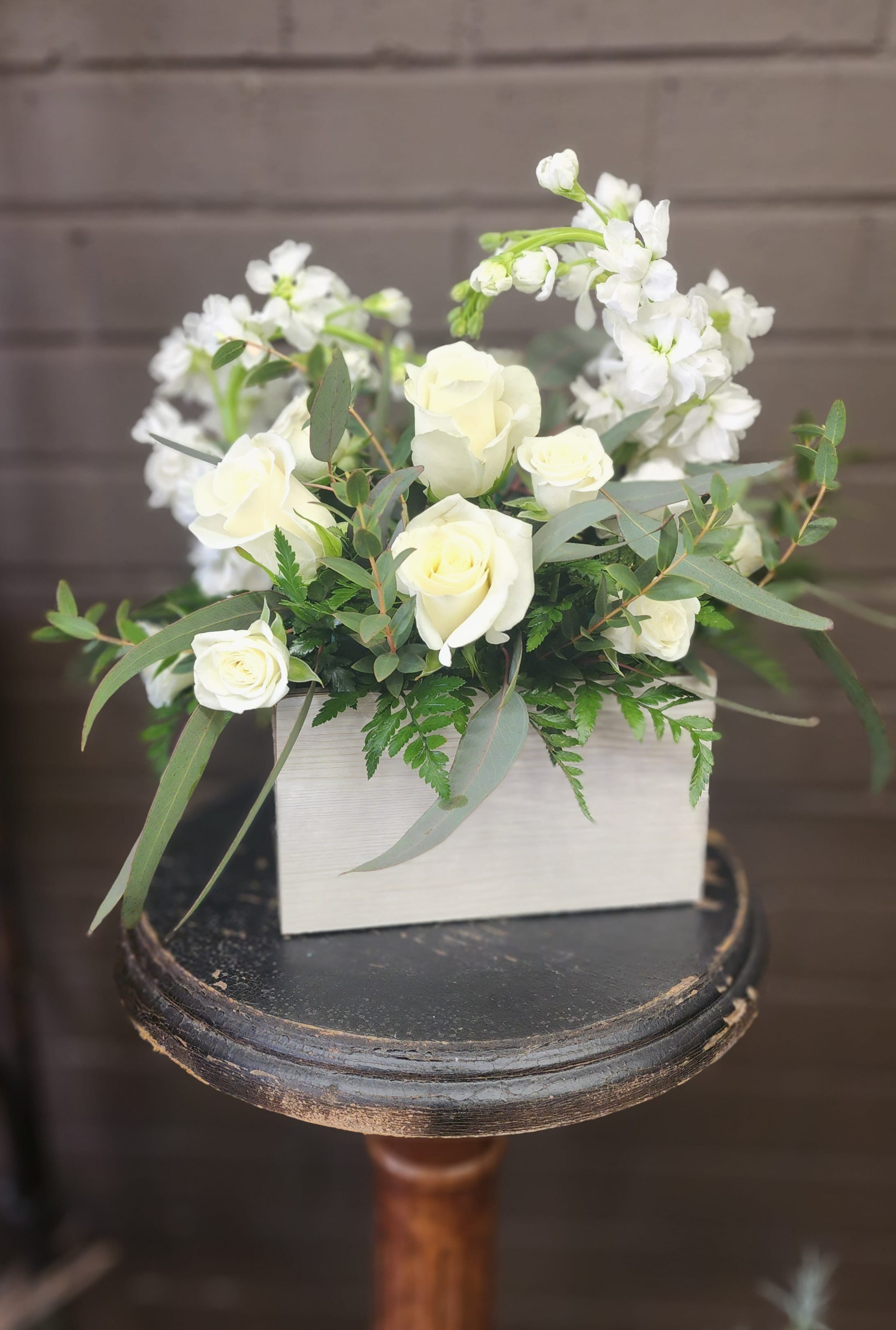 Heartfelt - Whether it's sympathy, get well soon or romance, this elegant all white arrangement relays the perfect sentiment. 