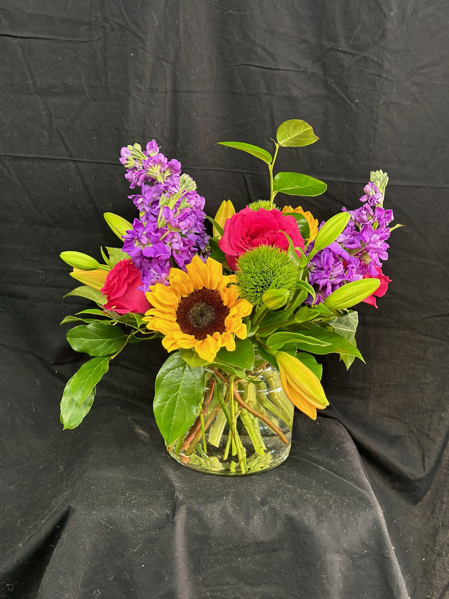 Rowan - It's a great day to send somebody this cheerful, uplifting arrangement!!