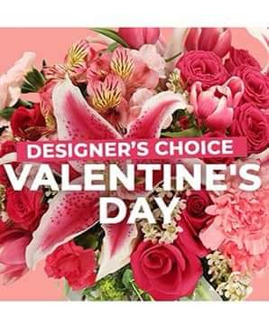 Designer's Holiday Choice - The designer will choose a holiday themed design with market fresh blooms! Designed in a container or vase! NO RED Rose's in standard choice. Only colored Rose's would be added for Deluxe and Premium. While fresh supplies last!