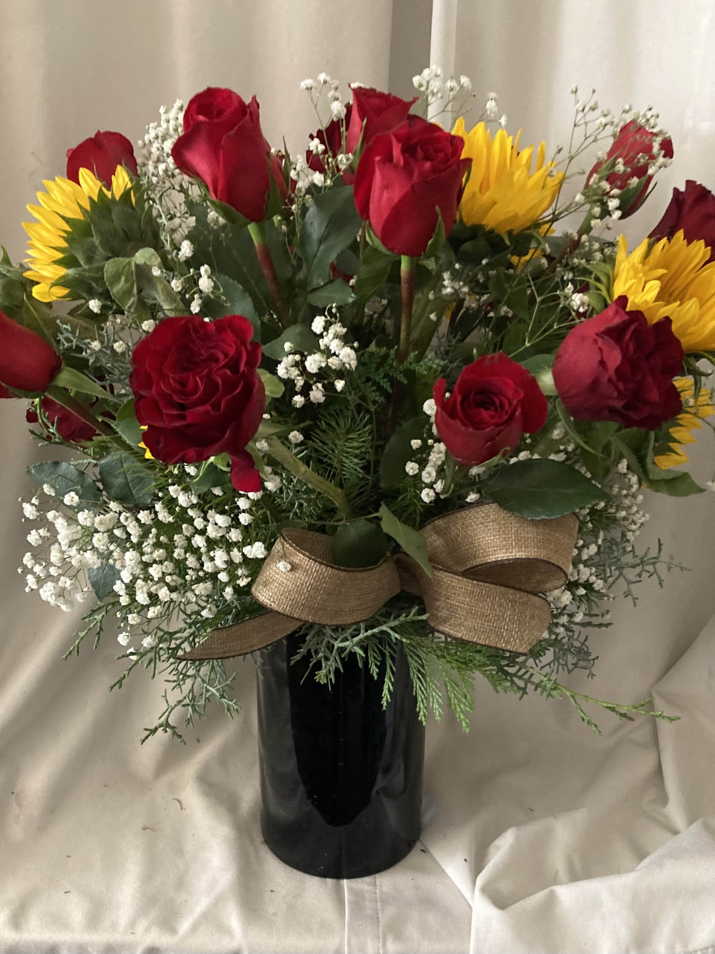 SUNSHINE AND ROSES - DOZEN RED ROSES AND SUNFLOWERS IN A STANDARD VASE
