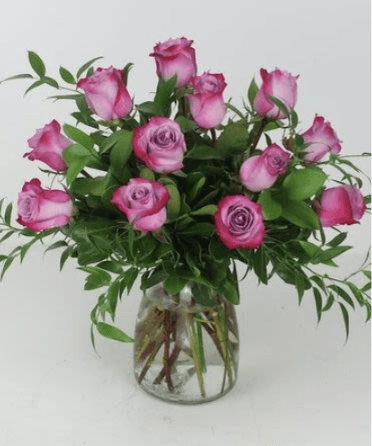 DOZEN LAVENDER ROSES - 12 STEMS OF ROSES, WITH GREENS, IN A STANDARD VASE