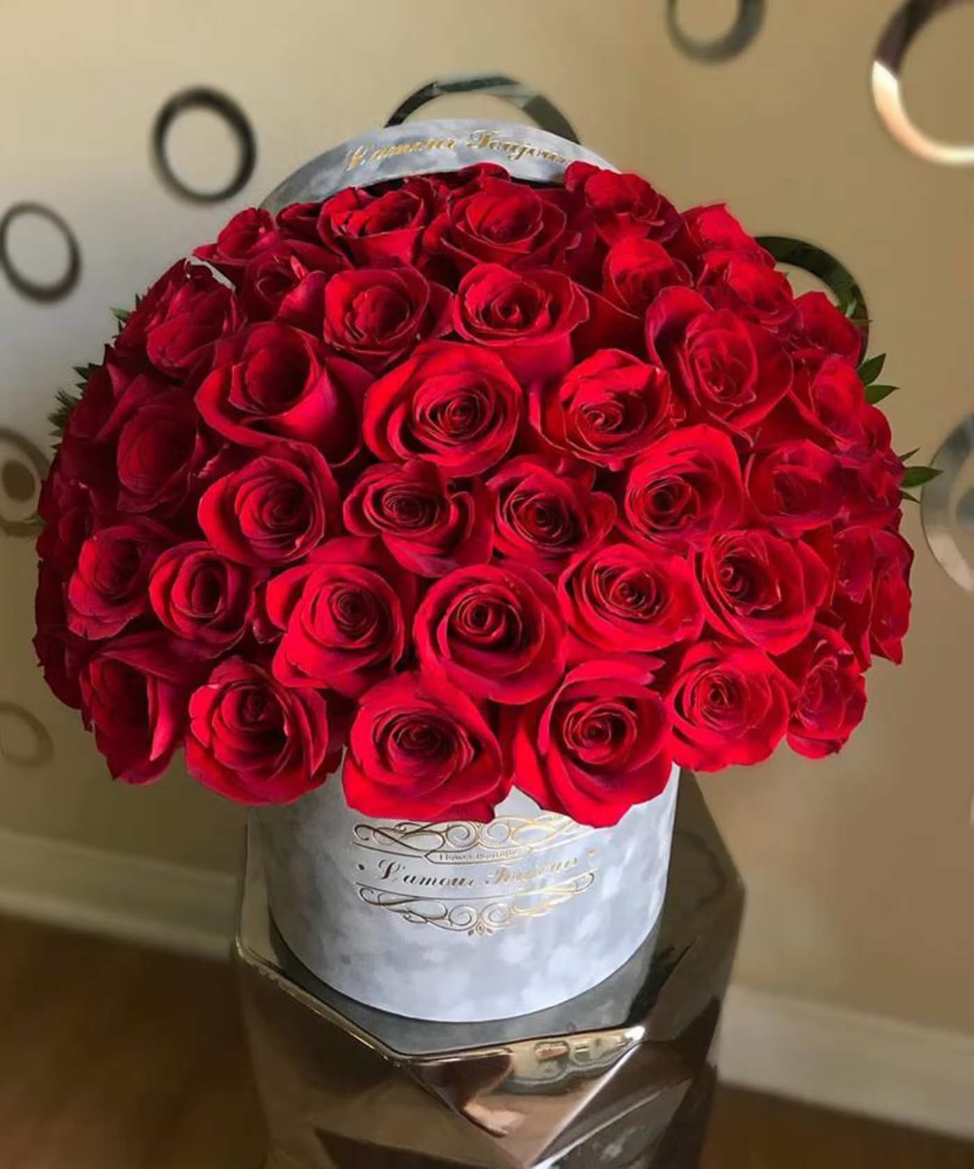 Luxury Gray Velvet Signature Box Red Roses - Discover premium flowers from L’amour Toujours Flower Boutique—luxury flowers designed to make every occasion unforgettable. Each arrangement features hand-selected blooms, beautifully arranged in our signature hatbox with a refined gold-foil monogram.  Perfect for birthdays, anniversaries, corporate gifting, or simply expressing love, our premium flower arrangements combine timeless elegance with modern sophistication.  As the ultimate luxury floral gift box, every detail is crafted to impress and delight. Elevate your gifting with fresh, hand-crafted flowers delivered in signature style—because every moment deserves to be remembered.